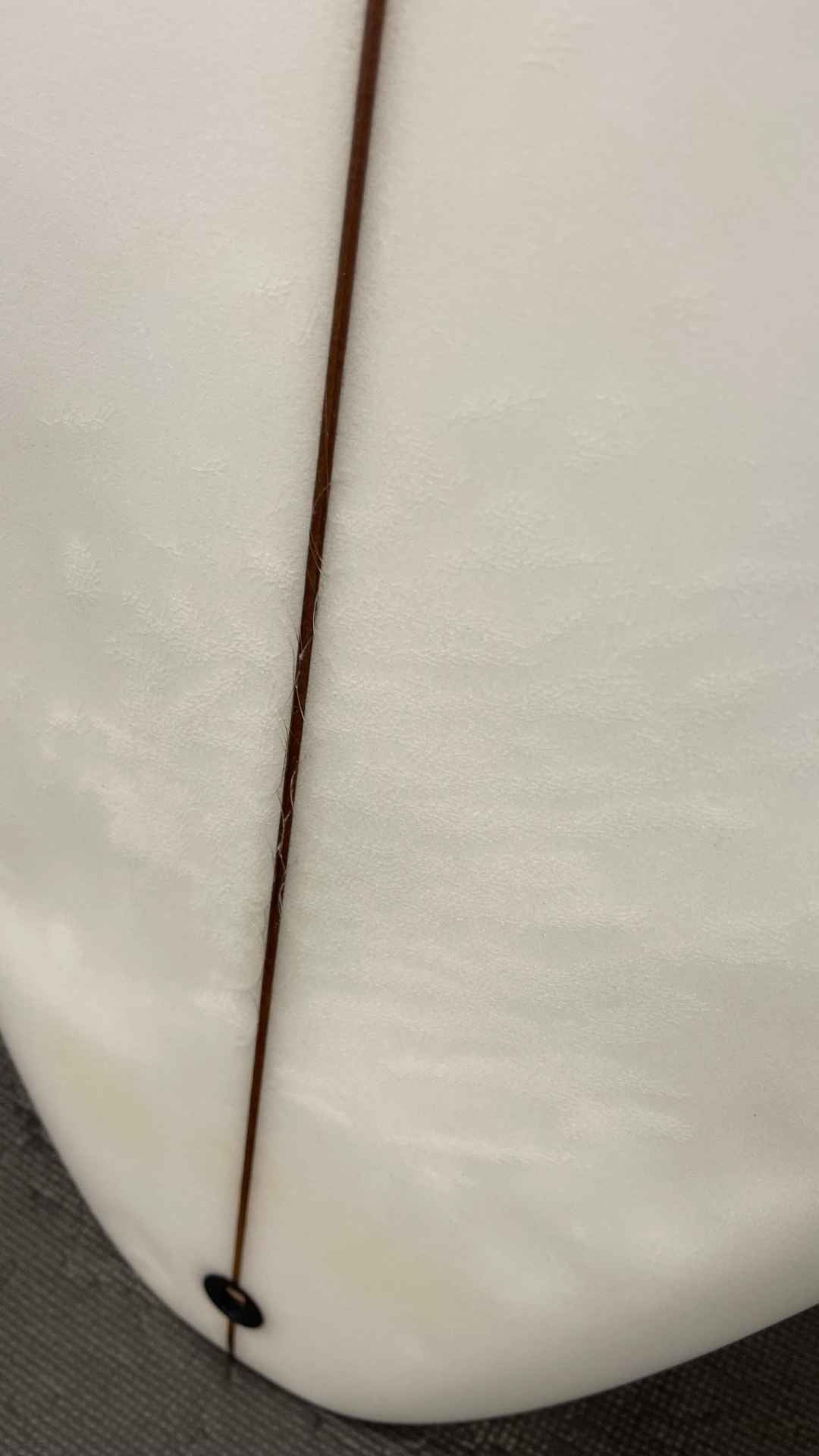 Delma 5'7"